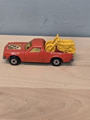 1977 Matchbox #60 Holden Pickup Red w/ Motorcycles
